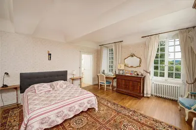Un ou plusieurs lits dans un hébergement de l'établissement Château pour se retrouver