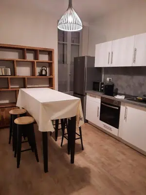 Cuisine ou kitchenette dans l'établissement Le Relais de la Gare