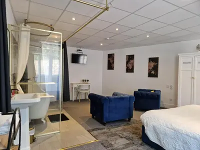 Un ou plusieurs lits dans un hébergement de l'établissement LE MANOIR- CLUNY