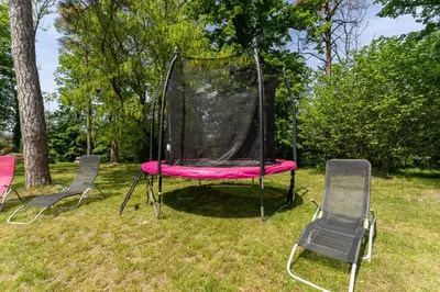 Jardin de l'établissement Gîte Parc des Chamois 3 chambres piscine chauffée