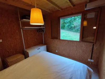 Un ou plusieurs lits dans un hébergement de l'établissement Gîte Chalet Morvan Bourgogne