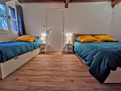 Un ou plusieurs lits dans un hébergement de l'établissement Moulin des ducs grand format by Vindihouses - piscine chaffée - escalade - billard - fitness - etc
