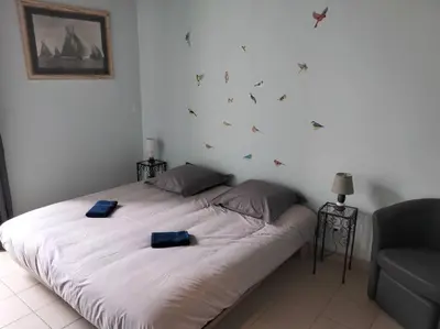Un ou plusieurs lits dans un hébergement de l'établissement Gîte de la tour