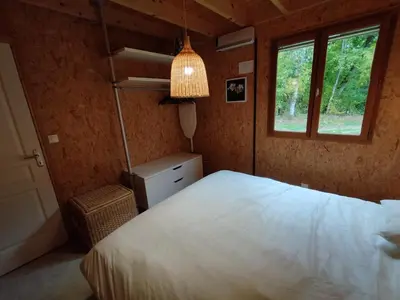 Un ou plusieurs lits dans un hébergement de l'établissement Gîte Chalet Morvan Bourgogne