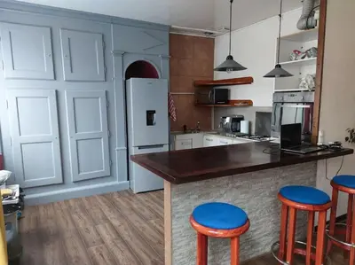 Cuisine ou kitchenette dans l'établissement Grand Appartement 82m2 Quartier historique Pasteur