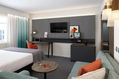 Télévision ou salle de divertissement dans l'établissement Holiday Inn Dijon Sud - Longvic by IHG