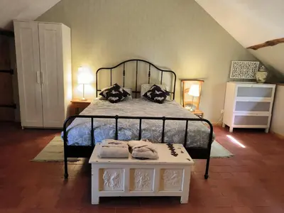 Un ou plusieurs lits dans un hébergement de l'établissement Chambres d'Hôtes Montjouan
