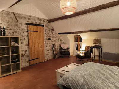 Un ou plusieurs lits dans un hébergement de l'établissement Chambres d'Hôtes Montjouan