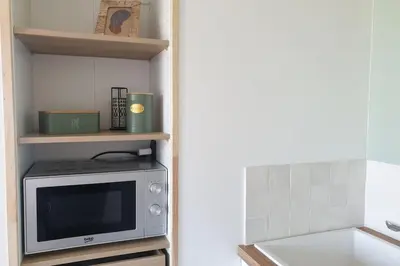 Cuisine ou kitchenette dans l'établissement Studio à la campagne
