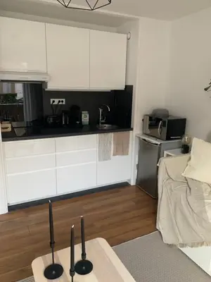 Cuisine ou kitchenette dans l'établissement Studio Tivoli la Tour