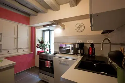 Cuisine ou kitchenette dans l'établissement Gites de Climats de 3 à 6 personnes