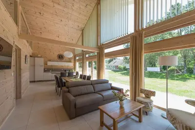 Coin salon dans l'établissement chalet bien-être 100m² -Gîte les 4 saisons - Lac de Chalain
