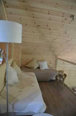 Un ou plusieurs lits dans un hébergement de l'établissement chalet bien-être 100m² -Gîte les 4 saisons - Lac de Chalain