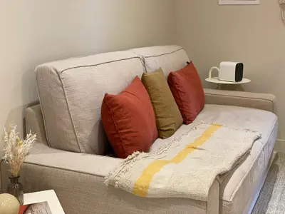 Coin salon dans l'établissement WELCOMING, LOVELY, CALM & CENTRALLY LOCATED FLAT