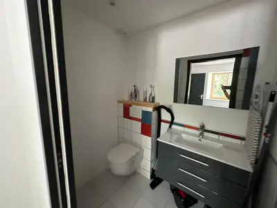 Salle de bains dans l'établissement LES ANTHOCYANES