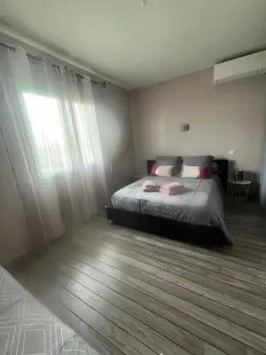 Un ou plusieurs lits dans un hébergement de l'établissement Chambres d'Hôtes chez Estelle
