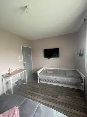 Un ou plusieurs lits dans un hébergement de l'établissement Chambres d'Hôtes chez Estelle
