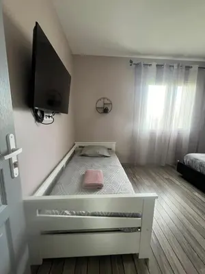 Un ou plusieurs lits dans un hébergement de l'établissement Chambres d'Hôtes chez Estelle