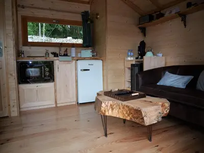 Cuisine ou kitchenette dans l'établissement La Cabane du Domaine des Ecus d'Or