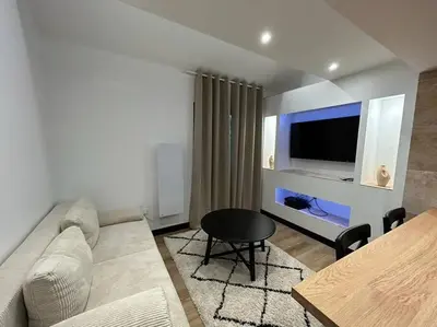 Coin salon dans l'établissement Le Darcy, grand appartement centre ville Dijon, proche gare