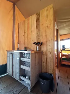 Cuisine ou kitchenette dans l'établissement Le Lodge du Hibou