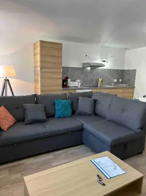Coin salon dans l'établissement Le St Martin Appart'