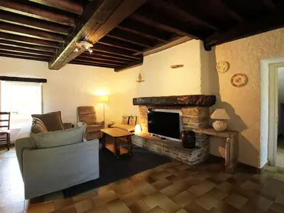 Coin salon dans l'établissement Agréable maison de campagne 12 voyageurs