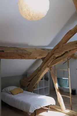 Un ou plusieurs lits dans un hébergement de l'établissement Le Gîte des 2 Fontaines
