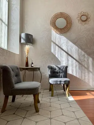 Coin salon dans l'établissement Chouette Appartement Dijon Centre