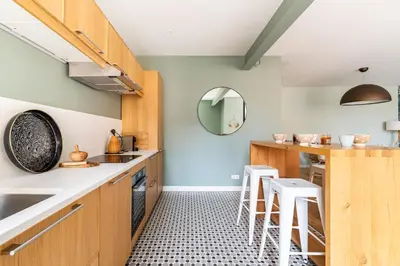 Cuisine ou kitchenette dans l'établissement LE BOSTON - Hypercentre - 150 M 2- 7 Guest