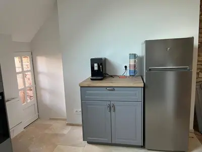 Cuisine ou kitchenette dans l'établissement Les clos de Givry - Clos Théodore - Appartement 88m2 climatisé avec sauna et petite terrasse
