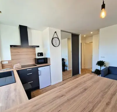 Cuisine ou kitchenette dans l'établissement Le Boléro - Studio