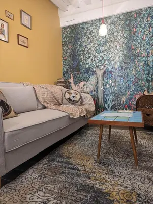 Coin salon dans l'établissement Chez Nick et Martine suite privative