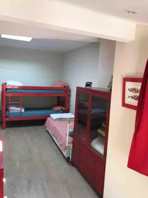 Un ou plusieurs lits dans un hébergement de l'établissement La maison de Lea, chambres d'hôtes de 14 couchages