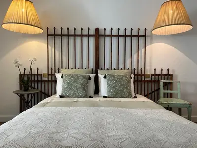 Un ou plusieurs lits dans un hébergement de l'établissement chambre d'hôtes Madame