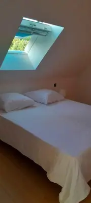 Un ou plusieurs lits dans un hébergement de l'établissement Gîte La Belle étoile - Paray-le-Monial