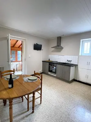 Cuisine ou kitchenette dans l'établissement Maison au pied de la Roche