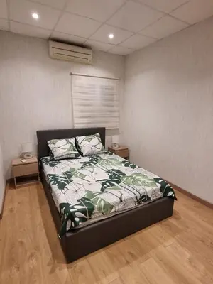 Un ou plusieurs lits dans un hébergement de l'établissement Appartement Centre ville