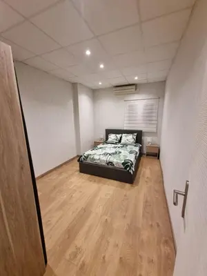 Un ou plusieurs lits dans un hébergement de l'établissement Appartement Centre ville