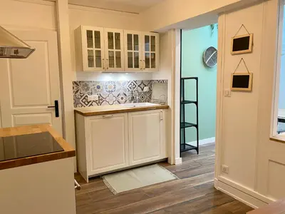 Cuisine ou kitchenette dans l'établissement Cité Gastro. / Centre Ville
