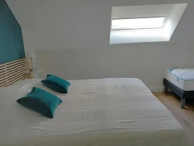 Un ou plusieurs lits dans un hébergement de l'établissement CHAMBRE D HOTES AU COEUR DE MEURSAULT
