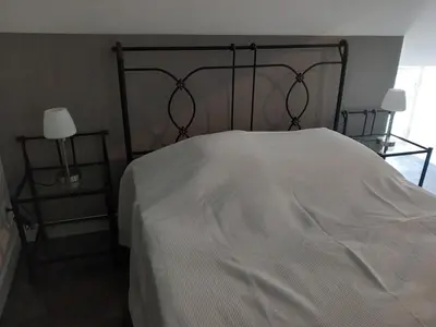Un ou plusieurs lits dans un hébergement de l'établissement CHAMBRE D HOTES AU COEUR DE MEURSAULT