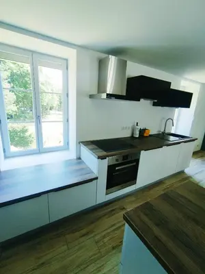 Cuisine ou kitchenette dans l'établissement Gte du Moulin Brochat 4 toiles avec espace jacuzzi commun