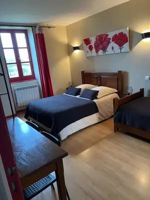 Un ou plusieurs lits dans un hébergement de l'établissement La Maison du Canal