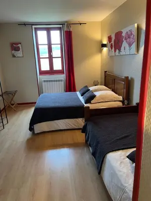 Un ou plusieurs lits dans un hébergement de l'établissement La Maison du Canal