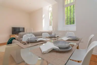 Coin salon dans l'établissement Magnifique logement spacieux hyper centre