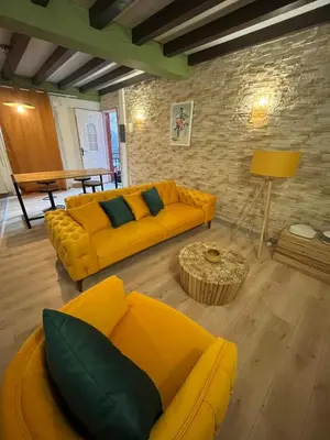 Coin salon dans l'établissement appart hôtel le 8 LE DUPLEX