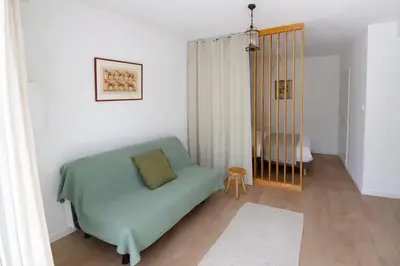 Coin salon dans l'établissement Le Caballo - Appartement de charme à Digoin