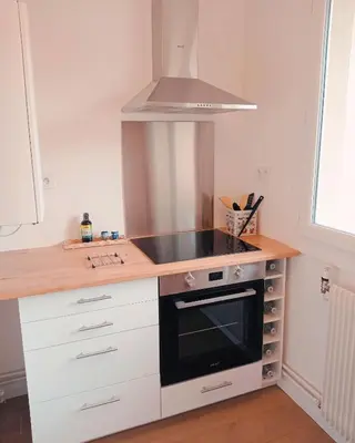 Cuisine ou kitchenette dans l'établissement Le Caballo - Appartement de charme à Digoin