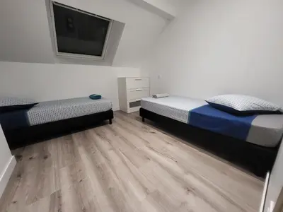 Un ou plusieurs lits dans un hébergement de l'établissement le duplex 4 personnes
